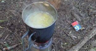 Cooking a one pot meal on a wood stove