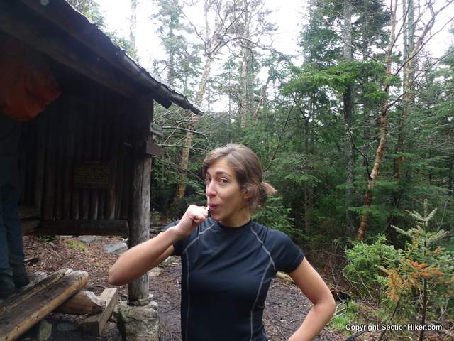 Karen, a Leave No Trace Master Educator, brushing her teeth on the Appalachian Trail