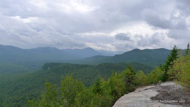 Storm Clouds massing over the Swift River Valley, seen from the ledges of Table Mountain