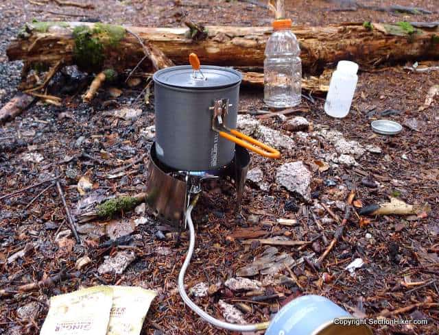 It is safe to use a wind screen with the Kovea Spider Remote Canister Stove because the burner s physically separate from the canister, preventing it from overheating or exploding.