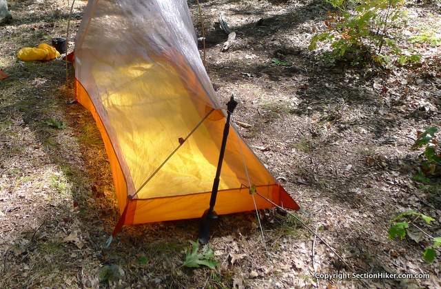 A collapsed trekking pole is required to hold up the rear of the inner tent and rain fly.