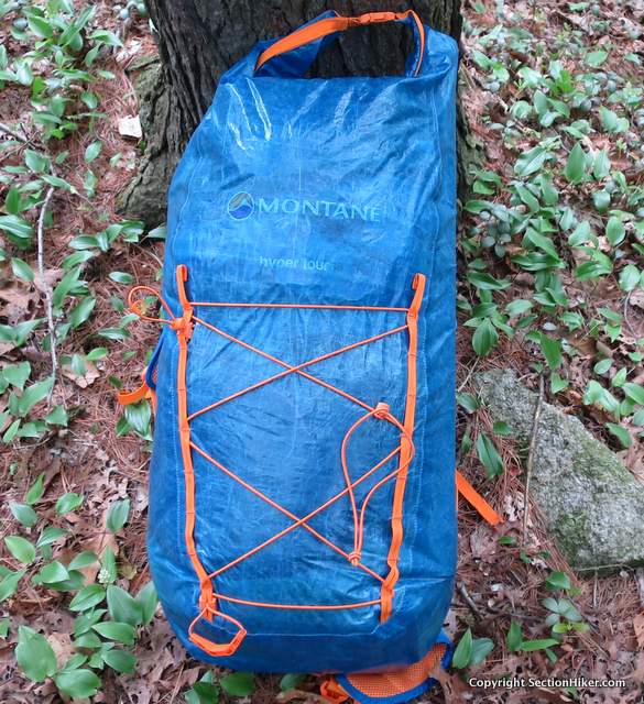 The Montane Hyper Tour 38 is a cuben fiber backpack with a roll top closure