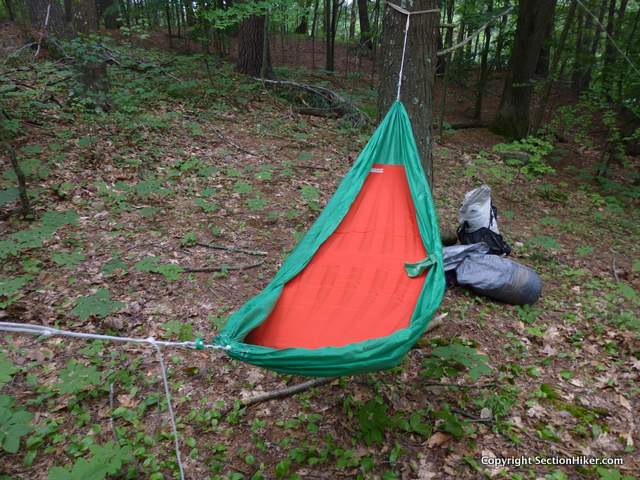 The self-inflating Slacker Hammock Sleeping Pad will work with any gathered end hammock. Shown here with a Hummingbird Hammocks Single
