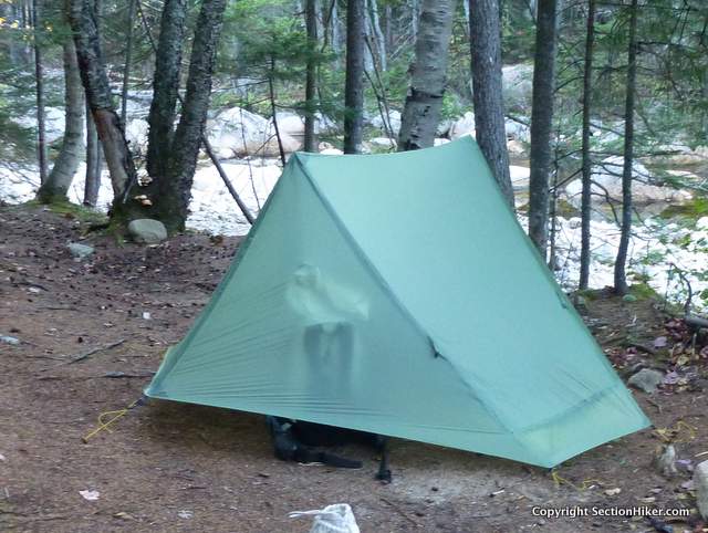 While the tent fabric is translucent, you really can't see into the tent in daylight unless items are flush against the fabric