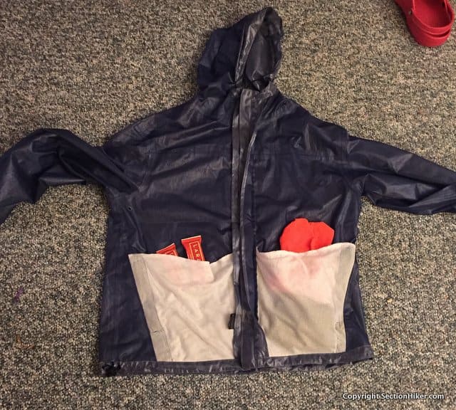Jacket turned inside out. The side pocket liners form interior pockets which can hold items you want to keep warm inside the jacket