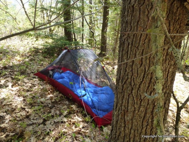 The Carbon Reflex 1 provides more interior comfort than a bivy sack, but requires the same amount of space to set up. 