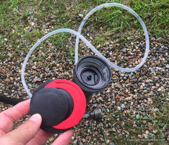 Its important to keep the bottom of the filter element, which screws onto your wide-mouth bottle clean. When not in use, you screw the filter cap onto it. When the red cescent attached to the cap can fit around the ceramic portion of the filter element, it's time to change the filter. 
