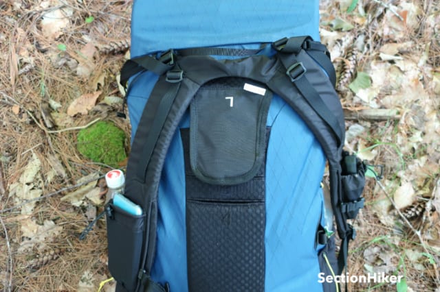 The shoulder strap yoke has a velcro-backed tongue that slots into different heights on the back of the pack in order to match your torso length.