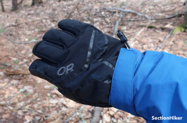 The velcro wrists cuffs can wrap around gauntlet gloves and really help to seal in the heat on cold days.