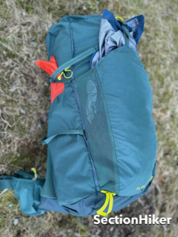 The front pocket is great for stuffing layers or a wet tent, with durable mesh side panels to help drain and dry items