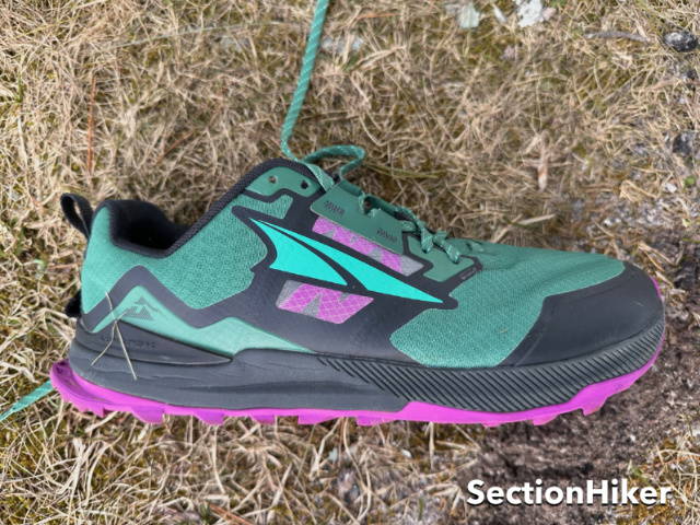 The Lone Peak 7 is a lightly cushioned trail runner with a moderate stack height