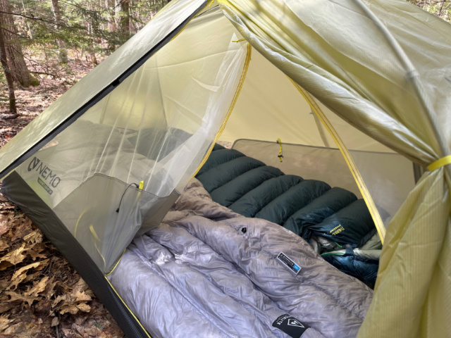 The tent is a big snug width wise for two, but there’s extra storage space at the ends.