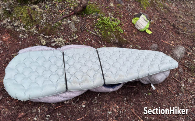 The 20-degree quilt comes with two pad attachment straps.