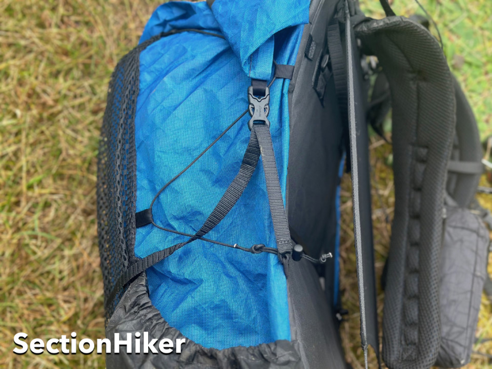 Zpacks now includes side webbing straps if you prefer to attach the ends of the roll top to the sides of the pack