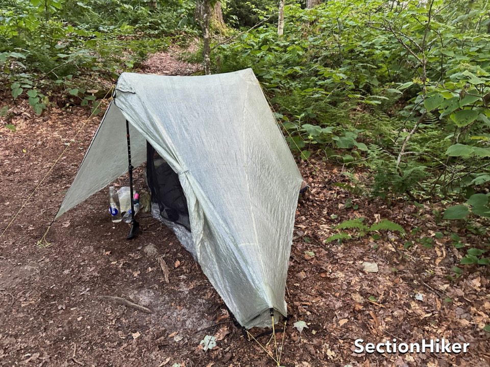 The ends of the tent are supported by tripods which create more room above the head and feet