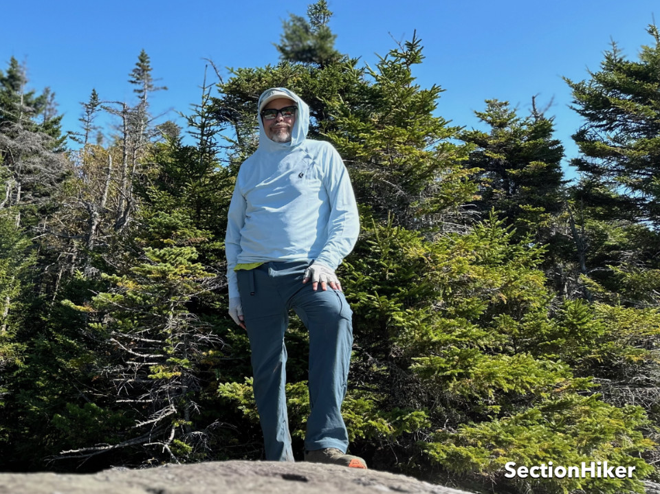 The hood is a bit oversized but provides great sun protection above treeline.