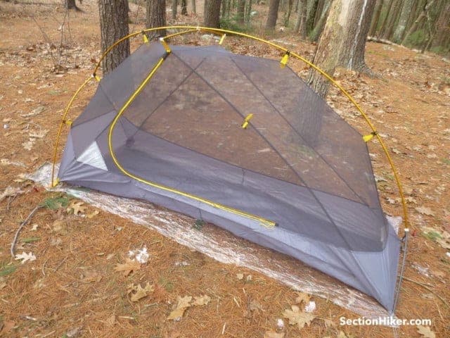 Trim the polycro to match the size of your tent floor
