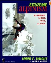 A climber ascends a steep, snowy rock face on the cover of Extreme Alpinism: Climbing Light, Fast, & High by Mark F. Twight and James Martin. The bold, colorful title reflects the fast and daring spirit of extreme alpinism.